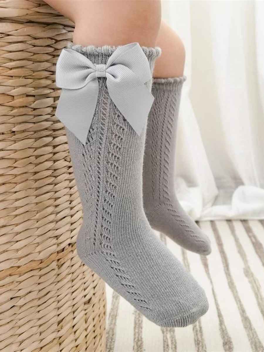 Ilgos kojinės su kaspinėliu